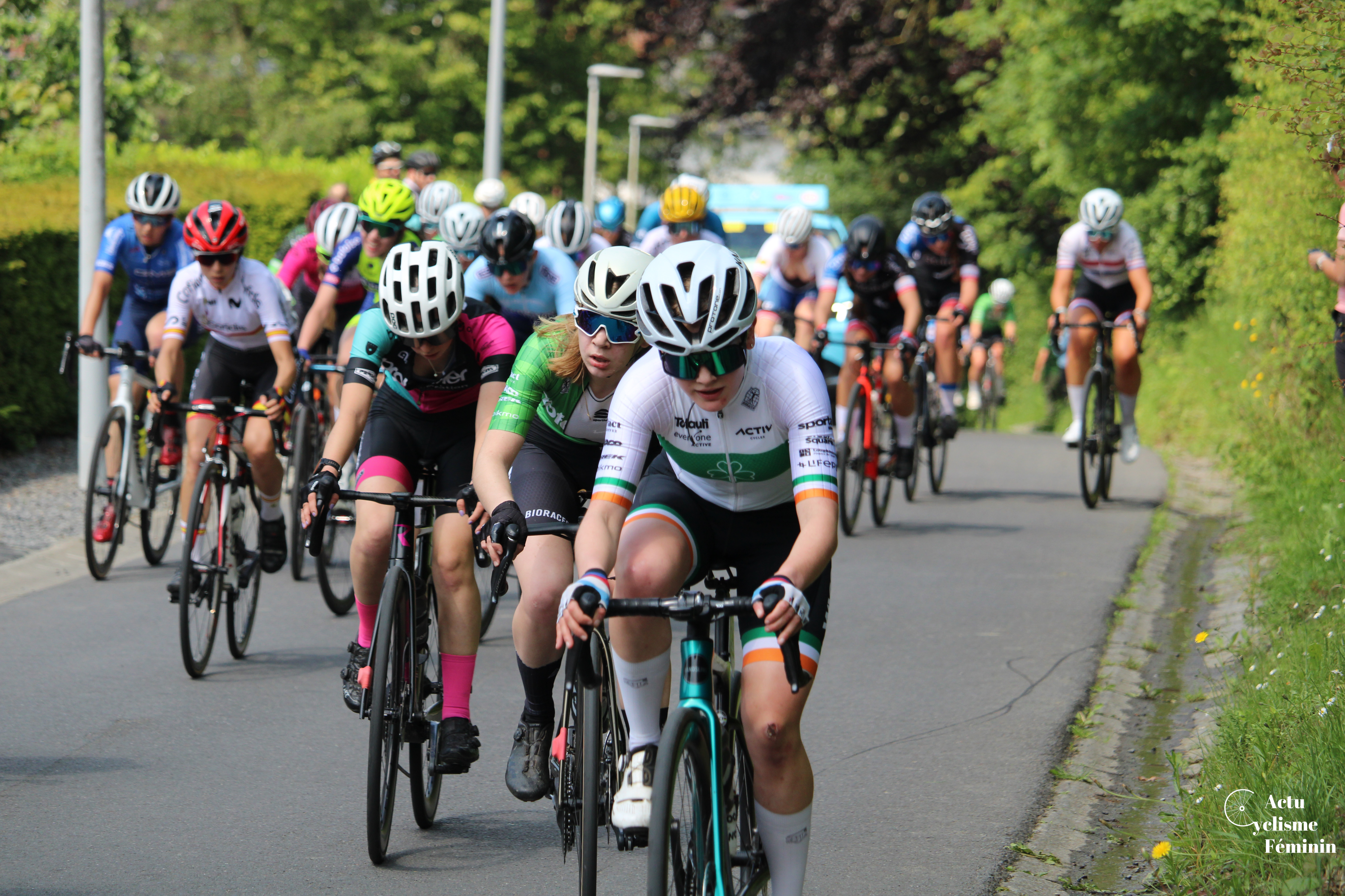 Coached riders competing in a bike race